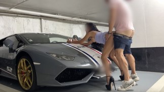 Luxury whore gets fucked by her client against the hood of his Lamborghini